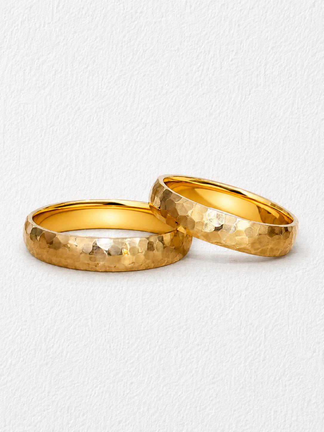 Pareja de alianzas de boda en oro de 18 quilates